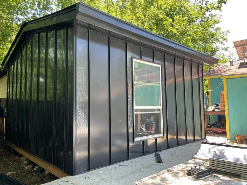 Black standing seam metal wall panels for Roof Inspection in Newtown